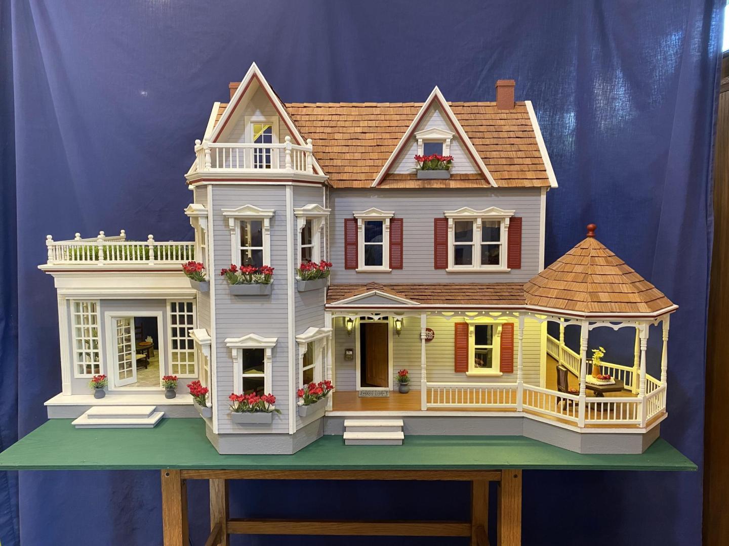 Norm and Sharon Ewert completely renovate and customize each of the wooden dollhouses.