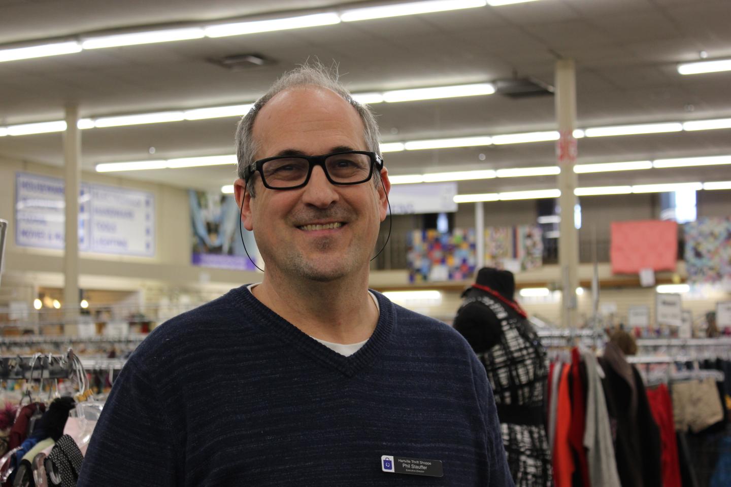 Phil Stauffer, manager of the Hartville Thrift Shoppe on the retail floor.