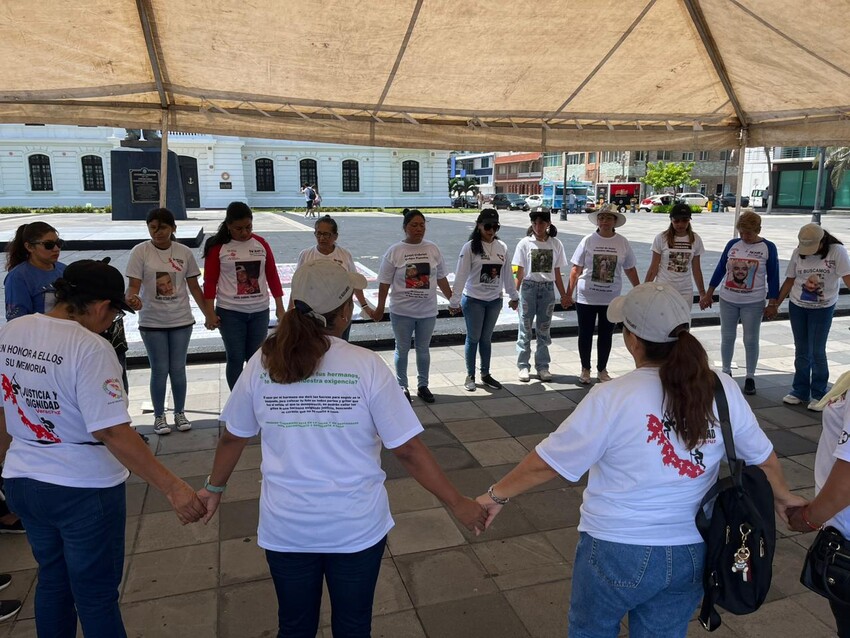 Relatives of disappeared people in Mexico gather in Veracruz, Mexico, for their annual Mother's Day march, holding banners and wearing shirts depicting their missing loved ones. After the march, relat