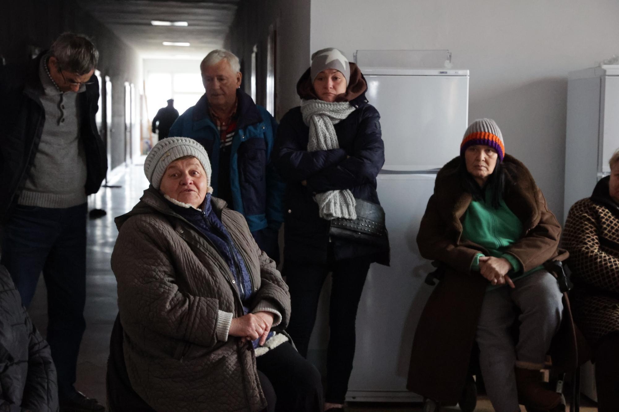 A group of people in a shelter