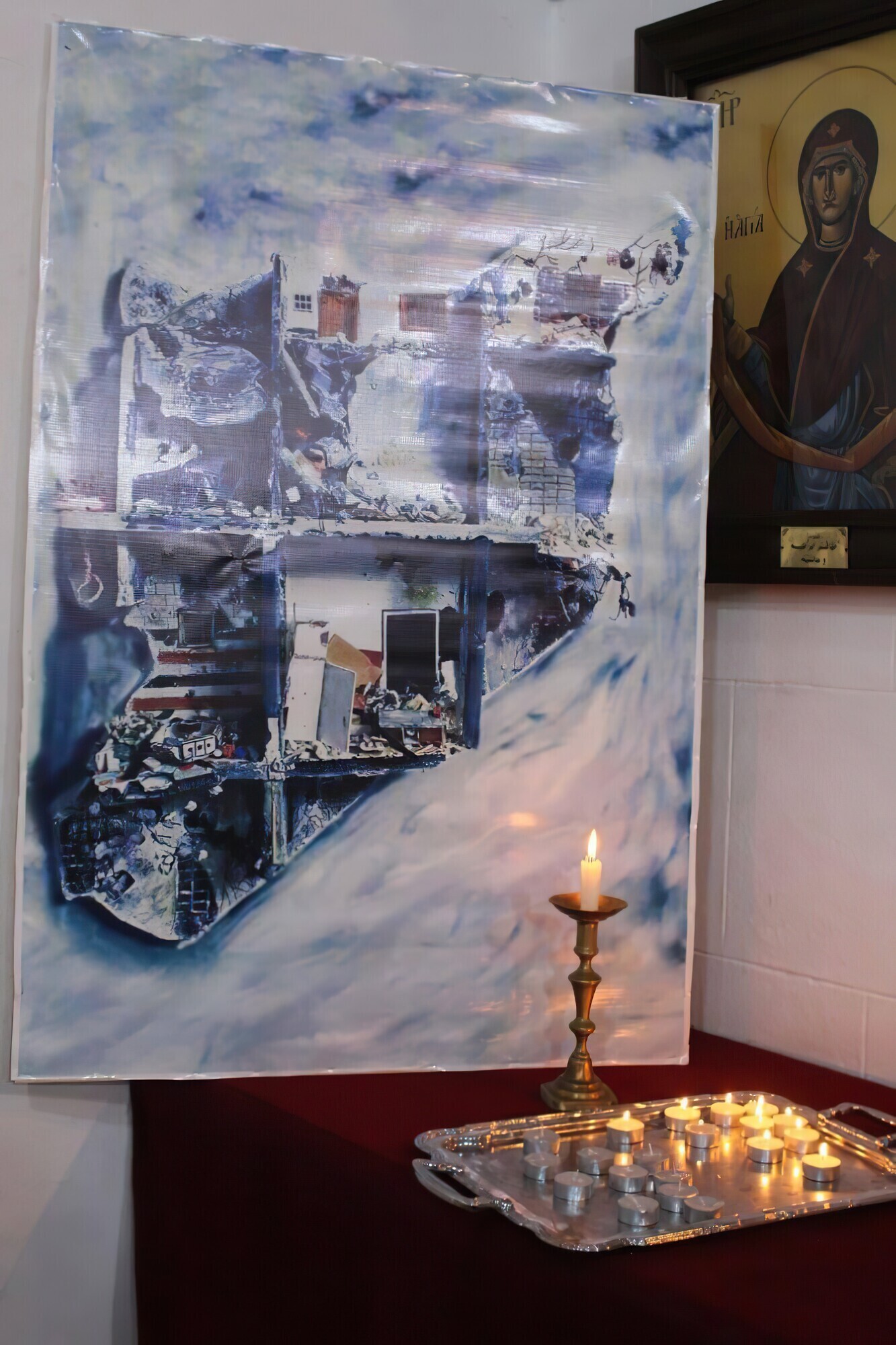 Artwork and candles in a church