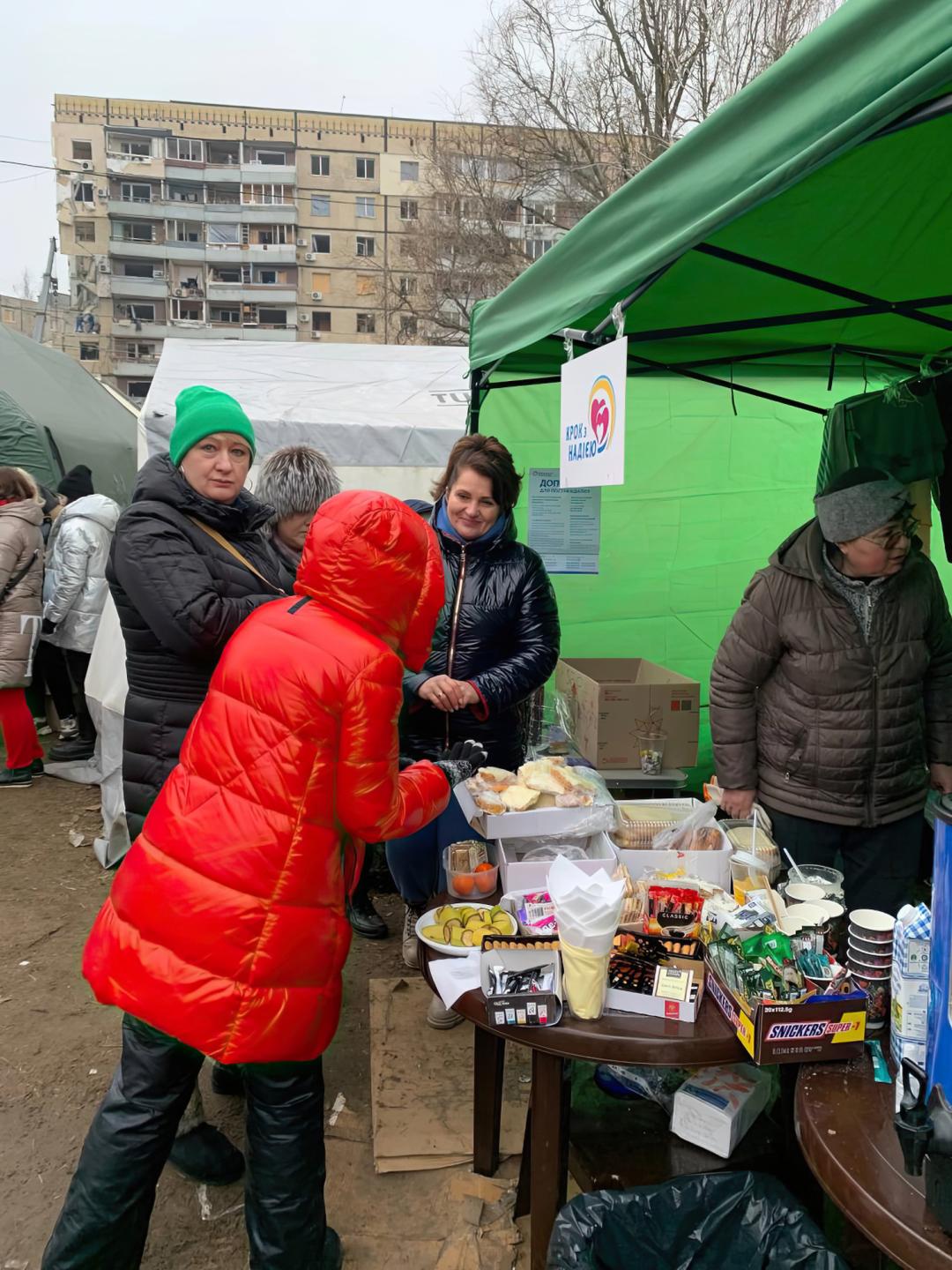 A group of people receiving emergency supplies