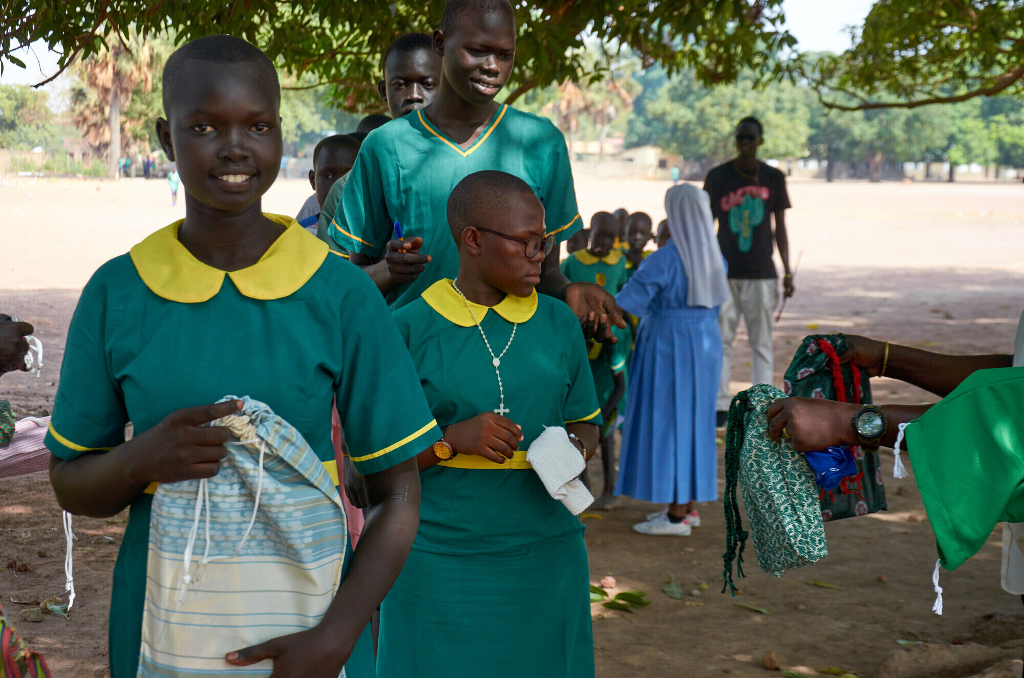 Students in line to receive school kits