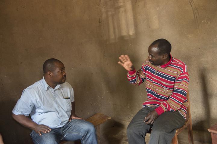 Emmanuel Billay Mussamba (right) of PPR (Programme for Peace and Reconciliation), who Michael Sharp worked with, talking with Mwasa Niyon Senga, a former rebel combatant who returned to Rwanda through a peacebuilding and repatriation program Mussamba worked with.