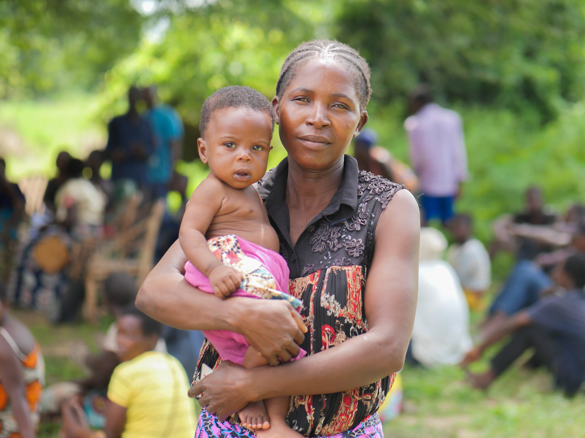 A woman holding a child