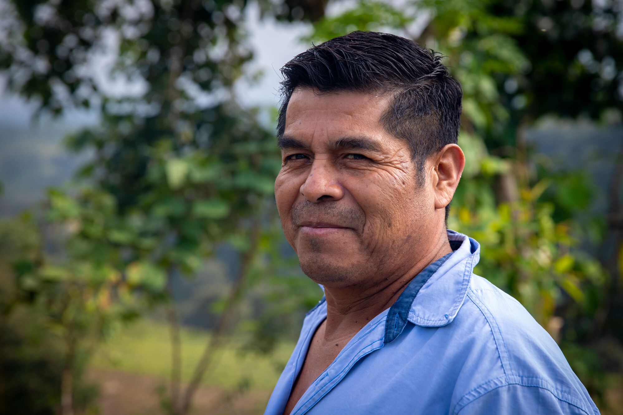 A man on his family farm in Chiapas, Mexico