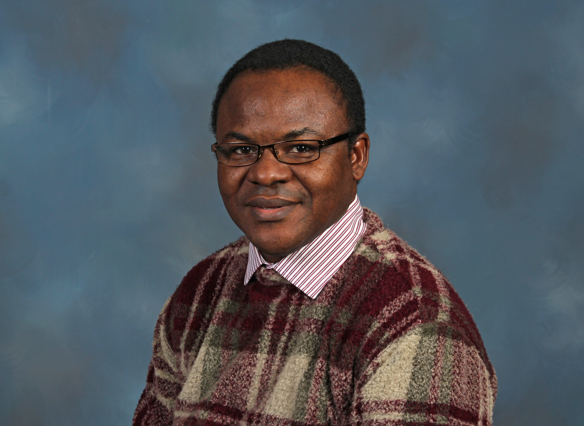 A headshot of Charles Obiorah Kwuelum