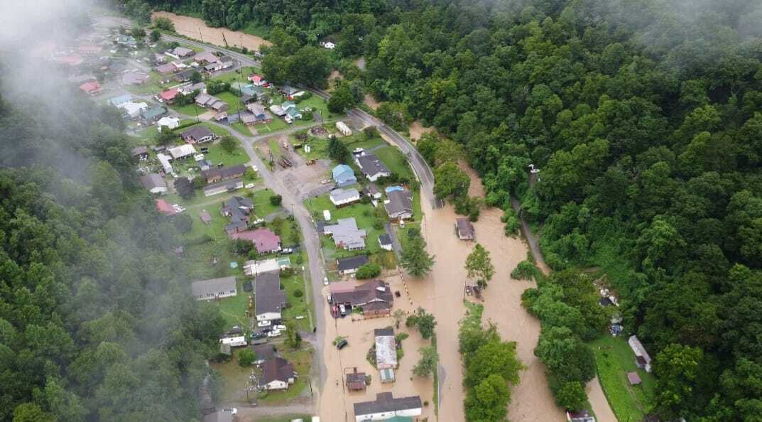 Drone photo showing flooded roads and homes from overhead