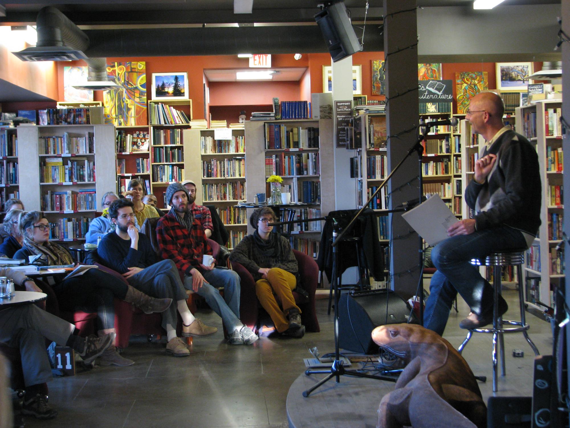 A man speaking to a group of people