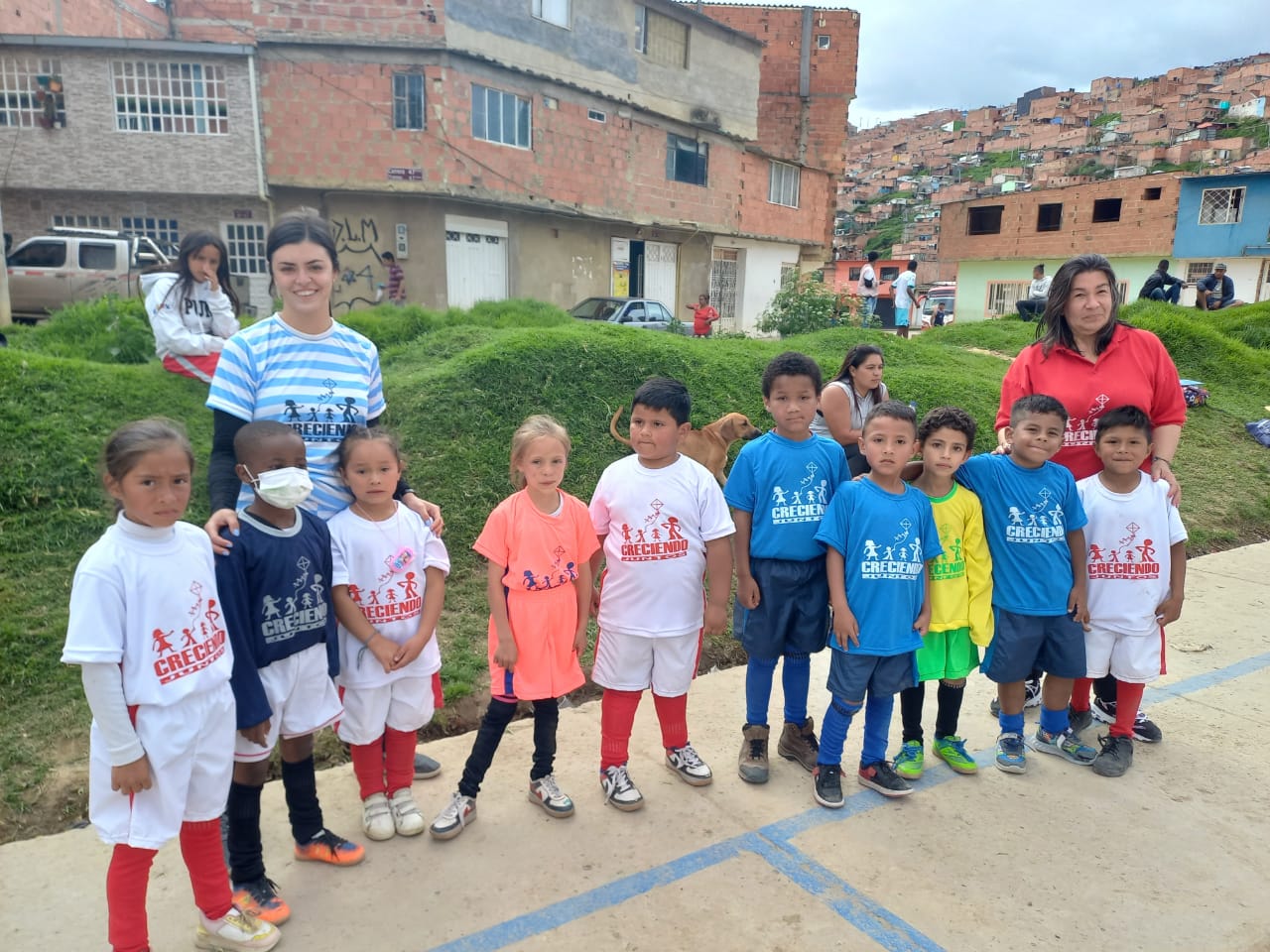 A group of children standing in row in Colombia