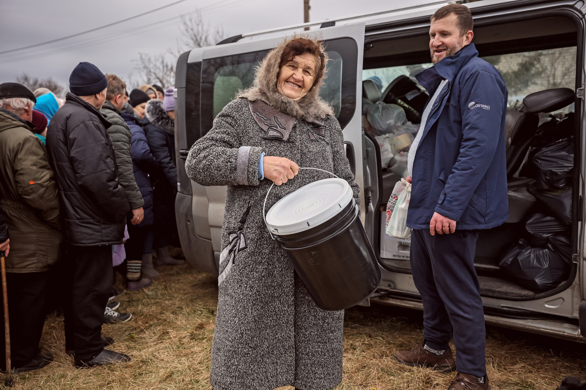 A woman receiving an MCC relief kit