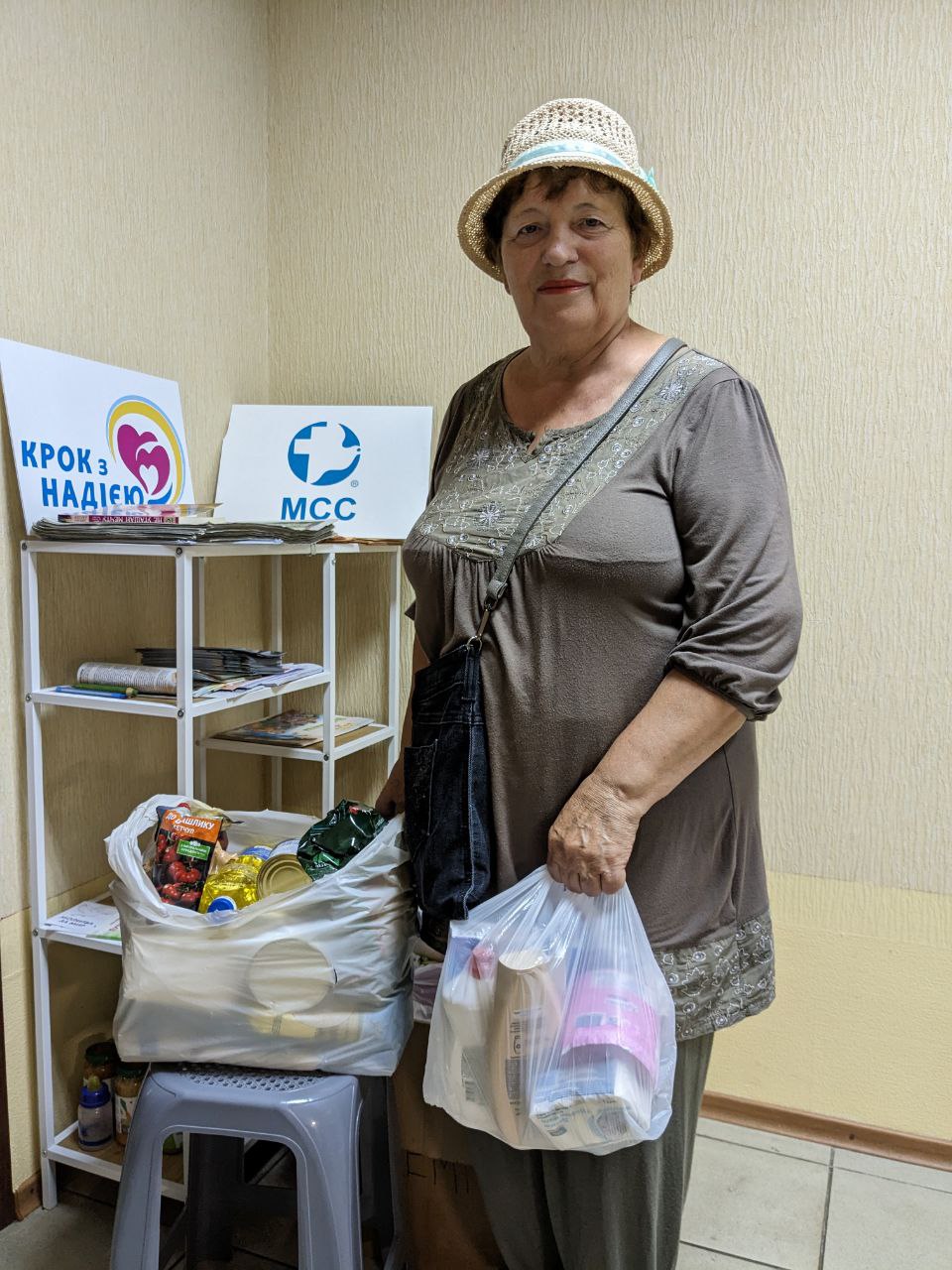 Anna receives food and psychosocial support from MCC partner Step With Hope. She and her husband fled her home after it was destroyed during the Russian invasion.