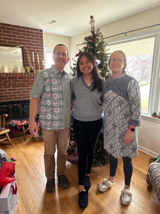 Eric Bendfeldt, Hulda Sharon and Mary Bendfeldt celebrate Christmas together. Eric and Mary are wearing Indonesian batik gifted by Sharon.