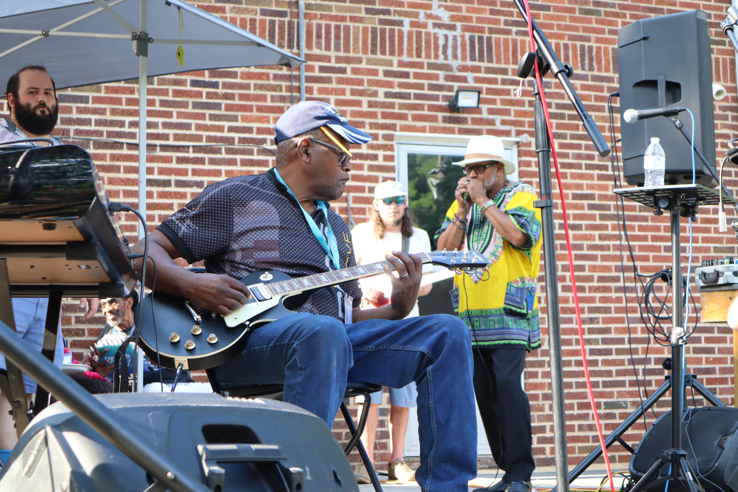 Blues band performs at the music festival for MCC. 
