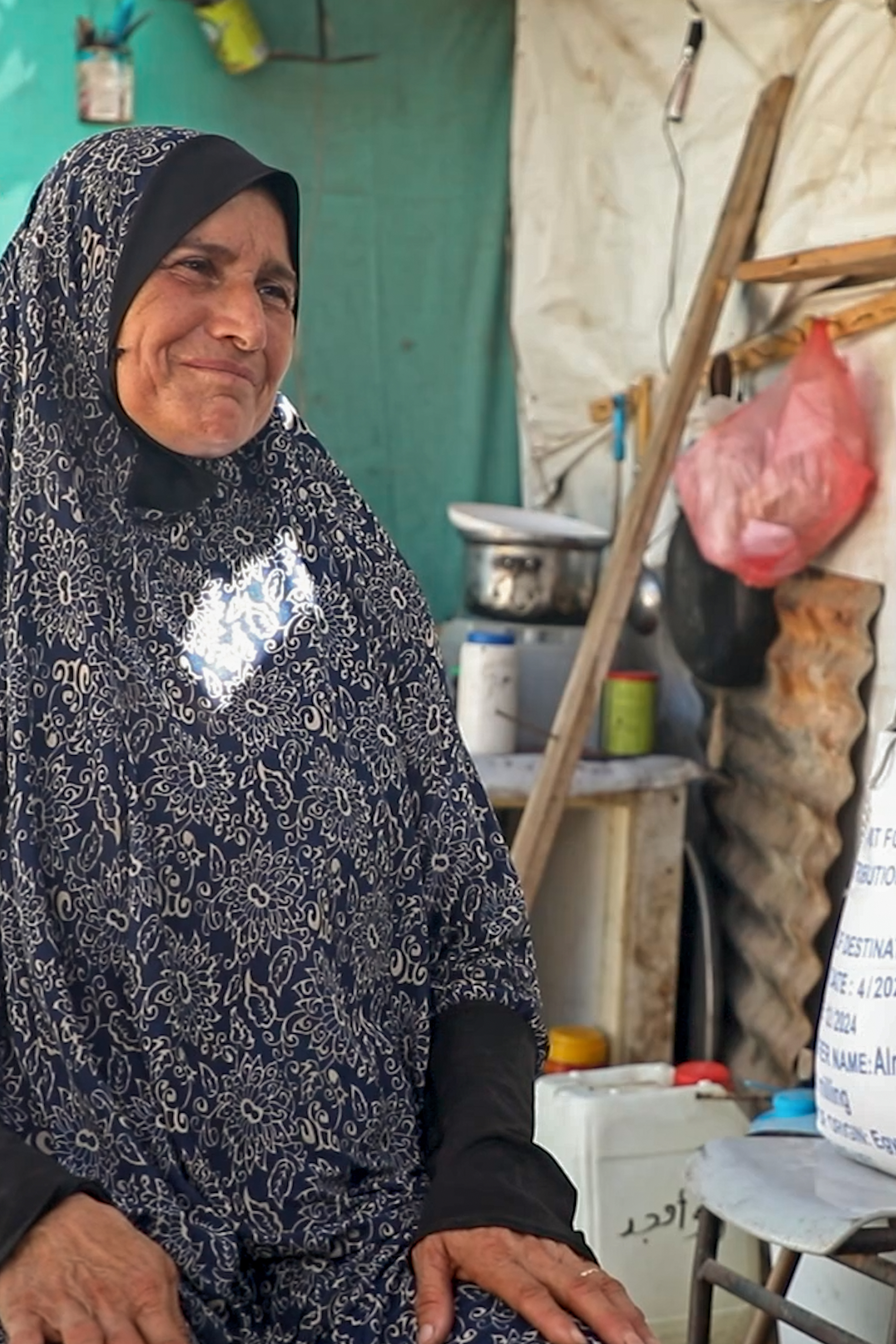 Woman standing in tent