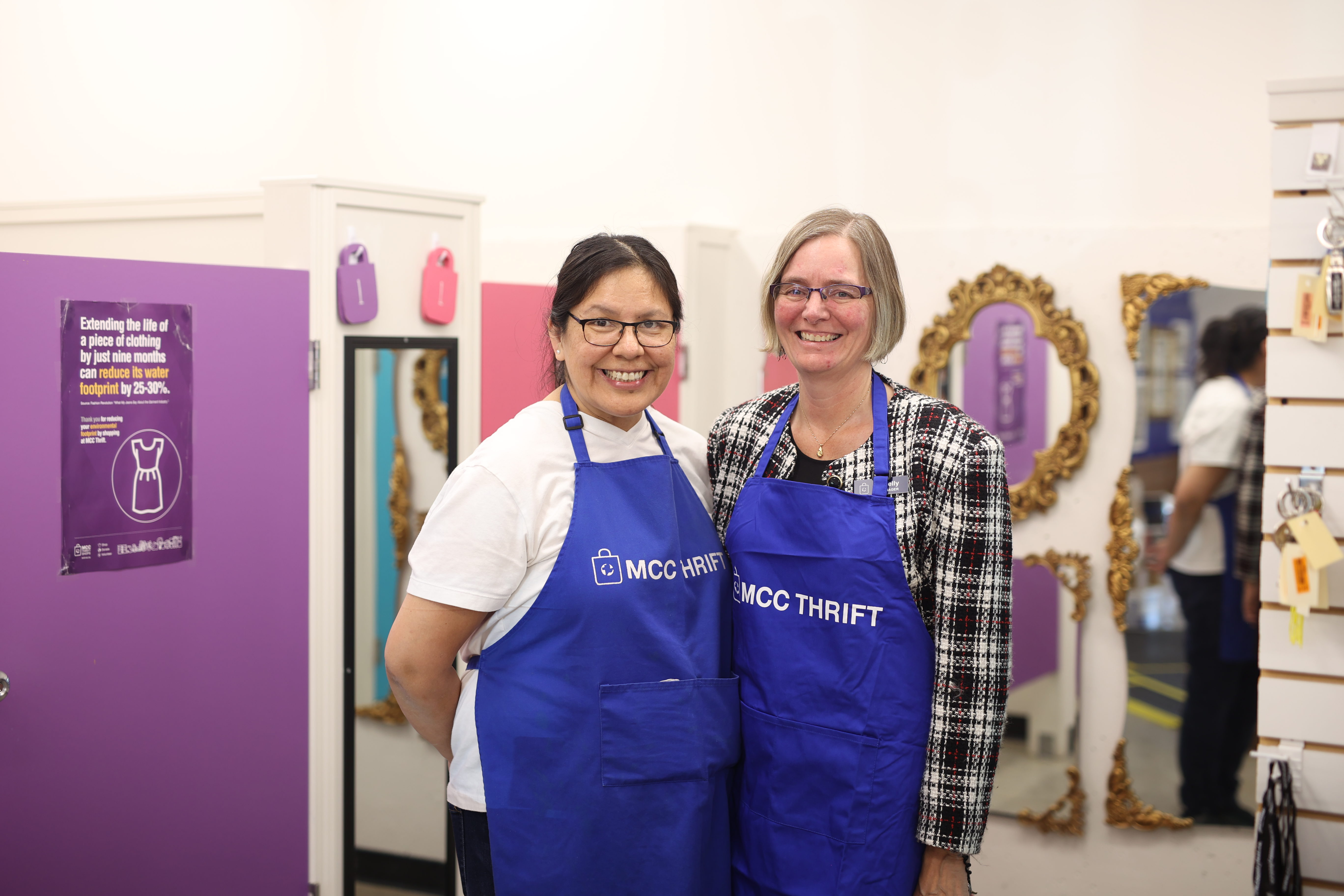 thrift store staff and volunteer in thrift store