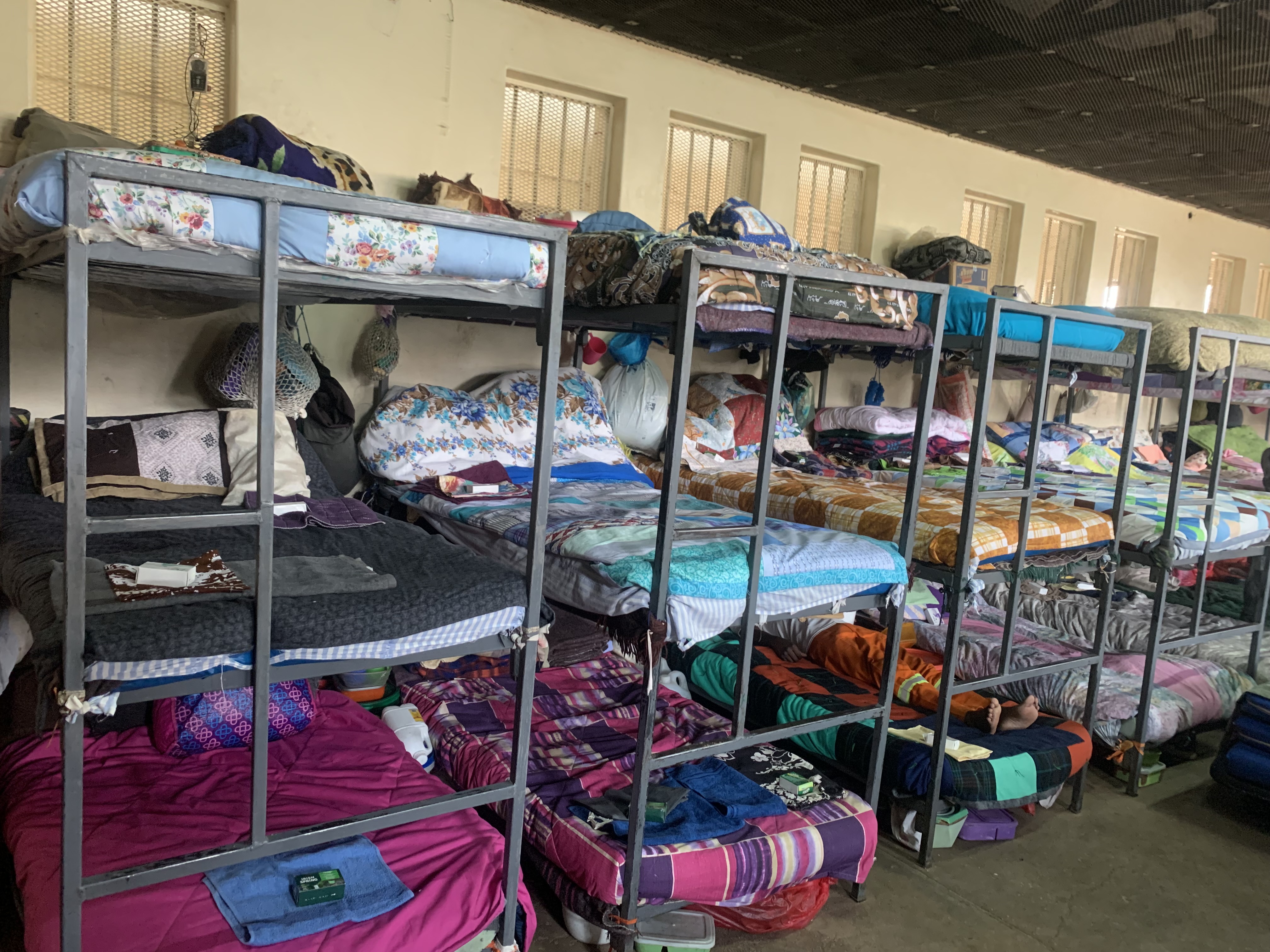 Colourful comforters are on bunk beds