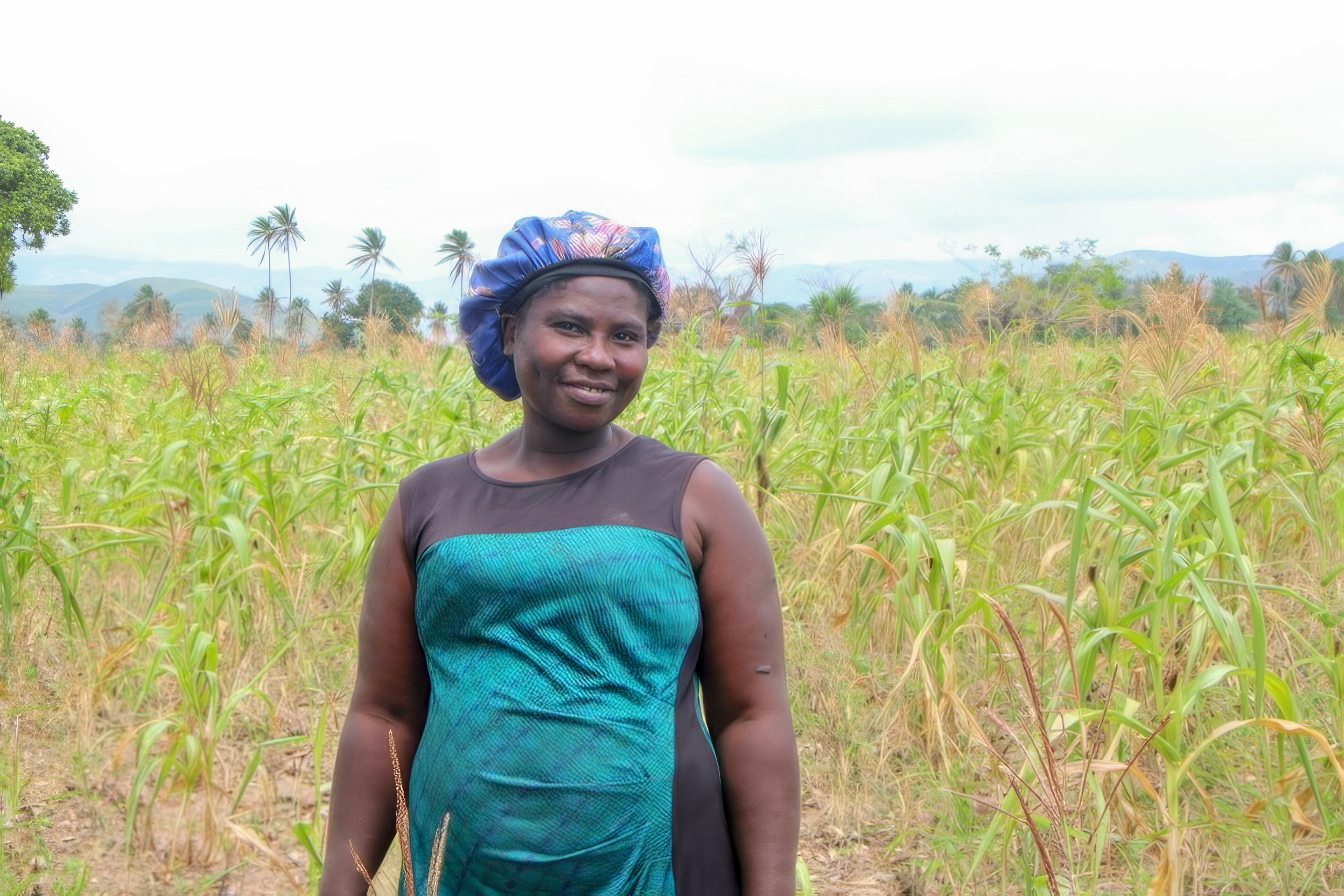 A portrait of Adline Pierrett. A woman from Grandye 1, Haiti who received training from ITECA to make money by growing crops, which helps support her family.