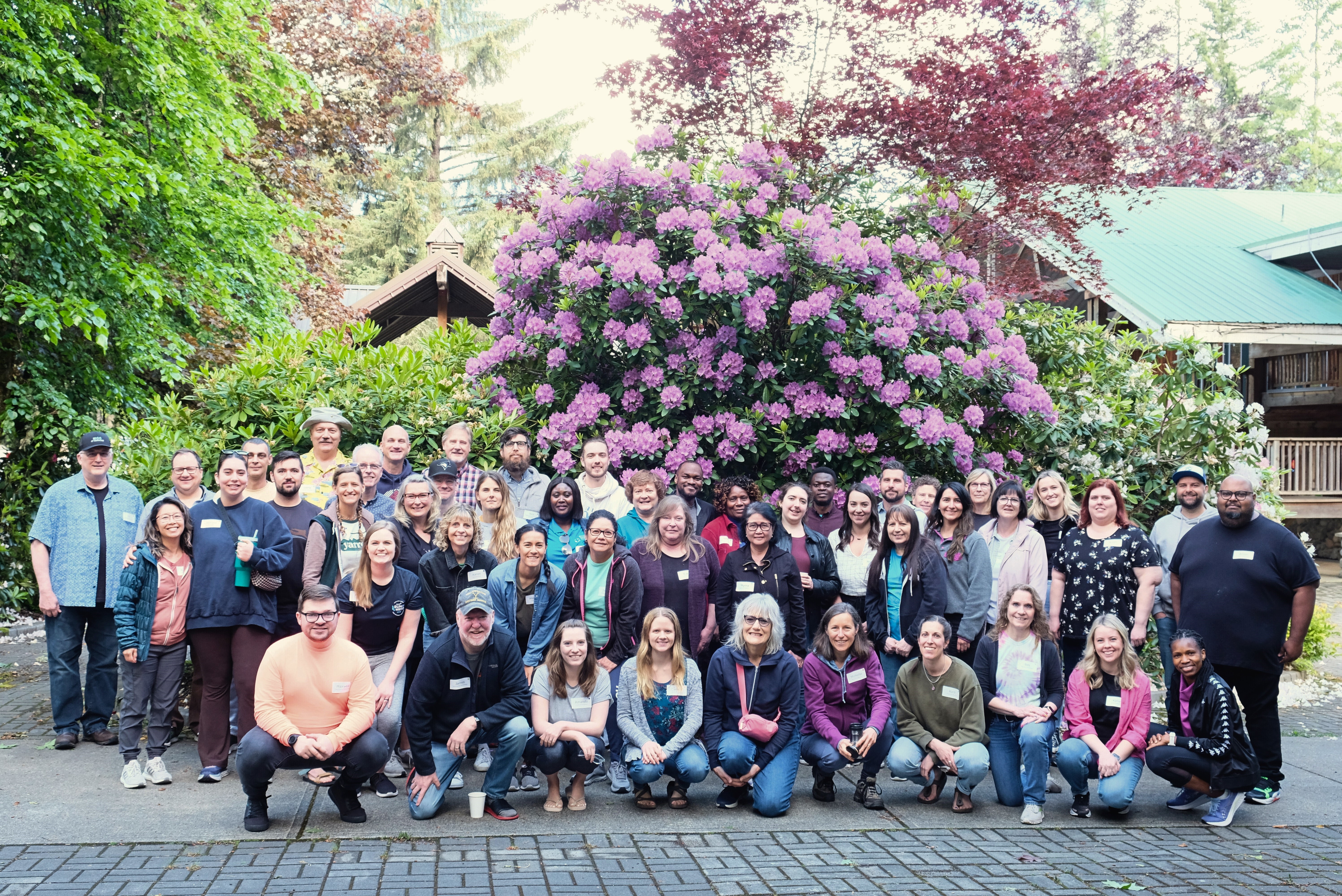 An outdoor group photo of the MCC BC team