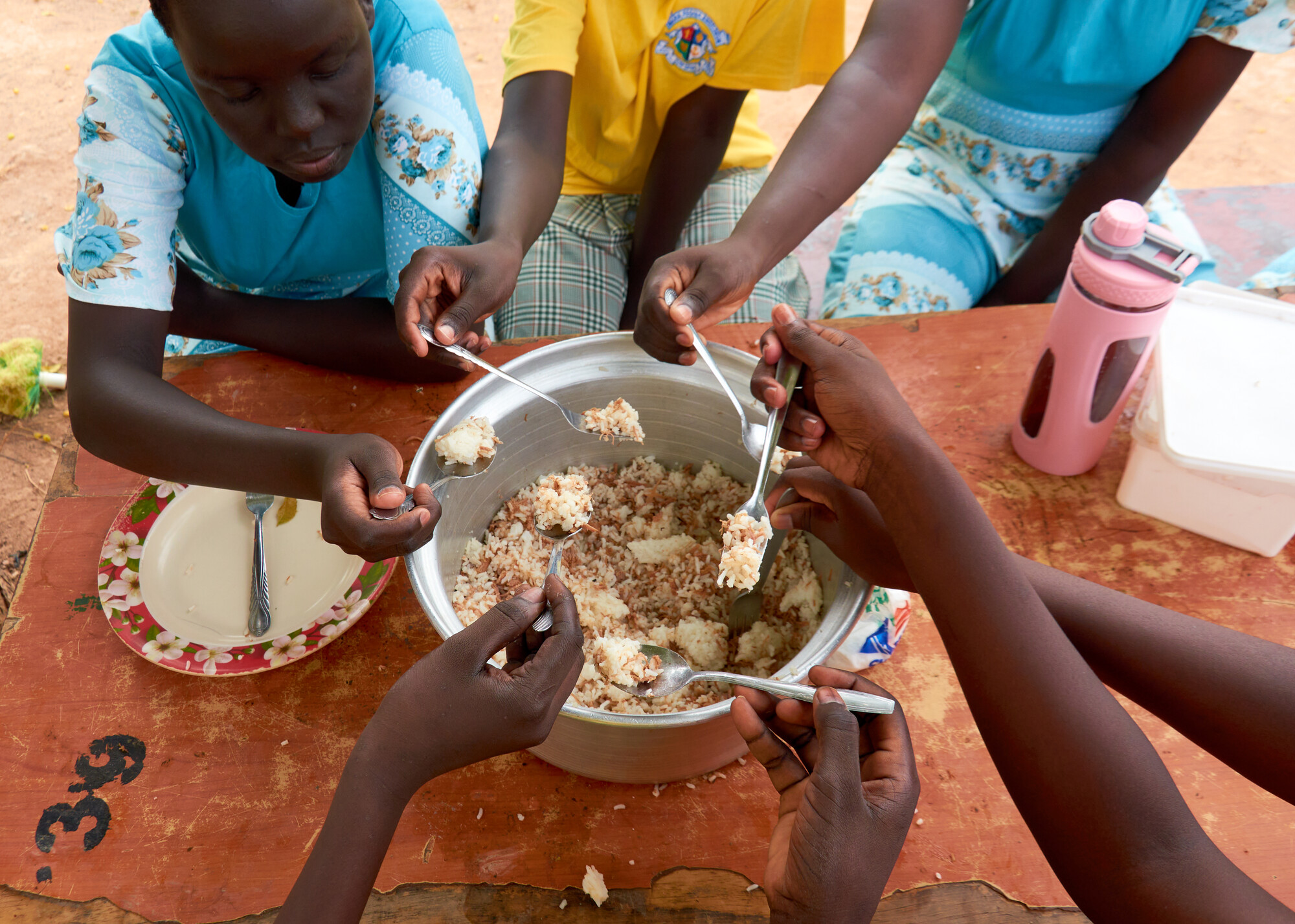 Kids enjoying a meal.