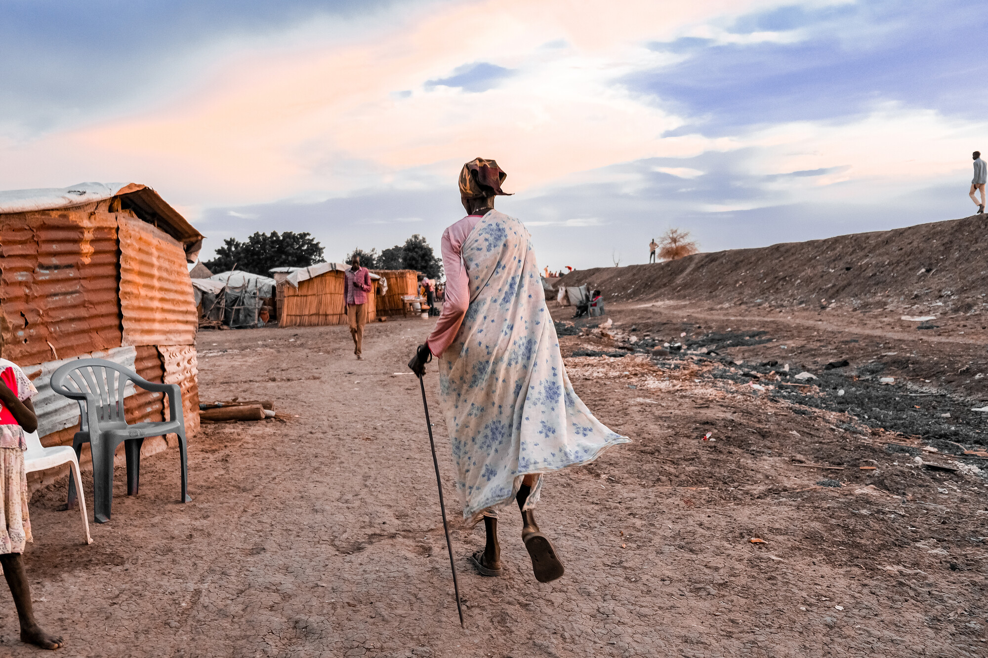 Lady walking in a small village