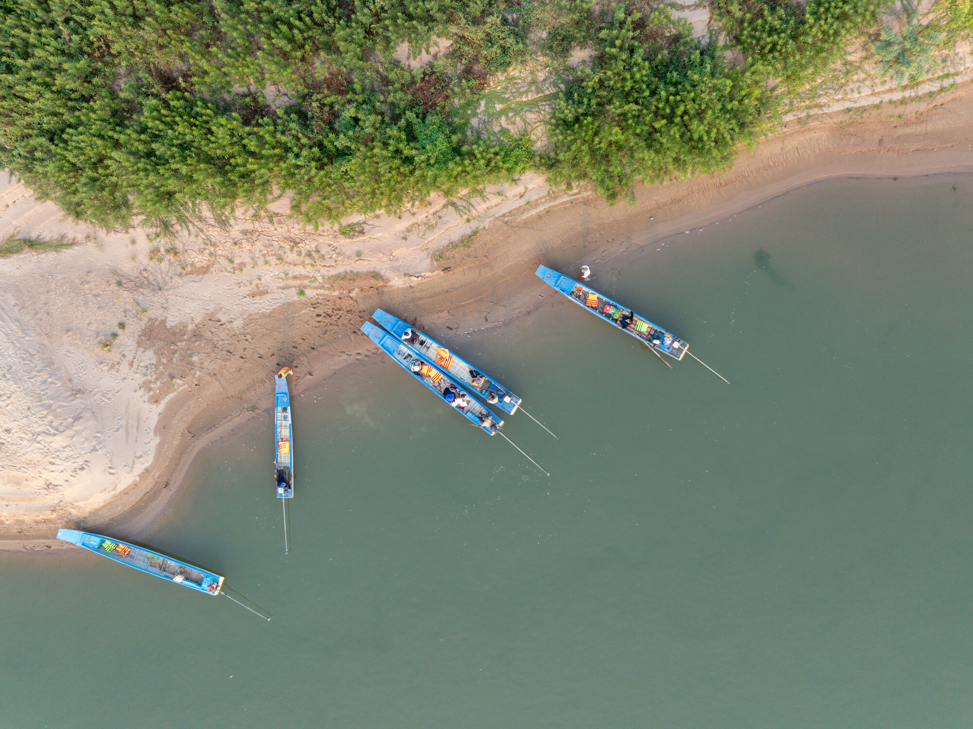 Arial view of fishing boats on a river in Cambodia