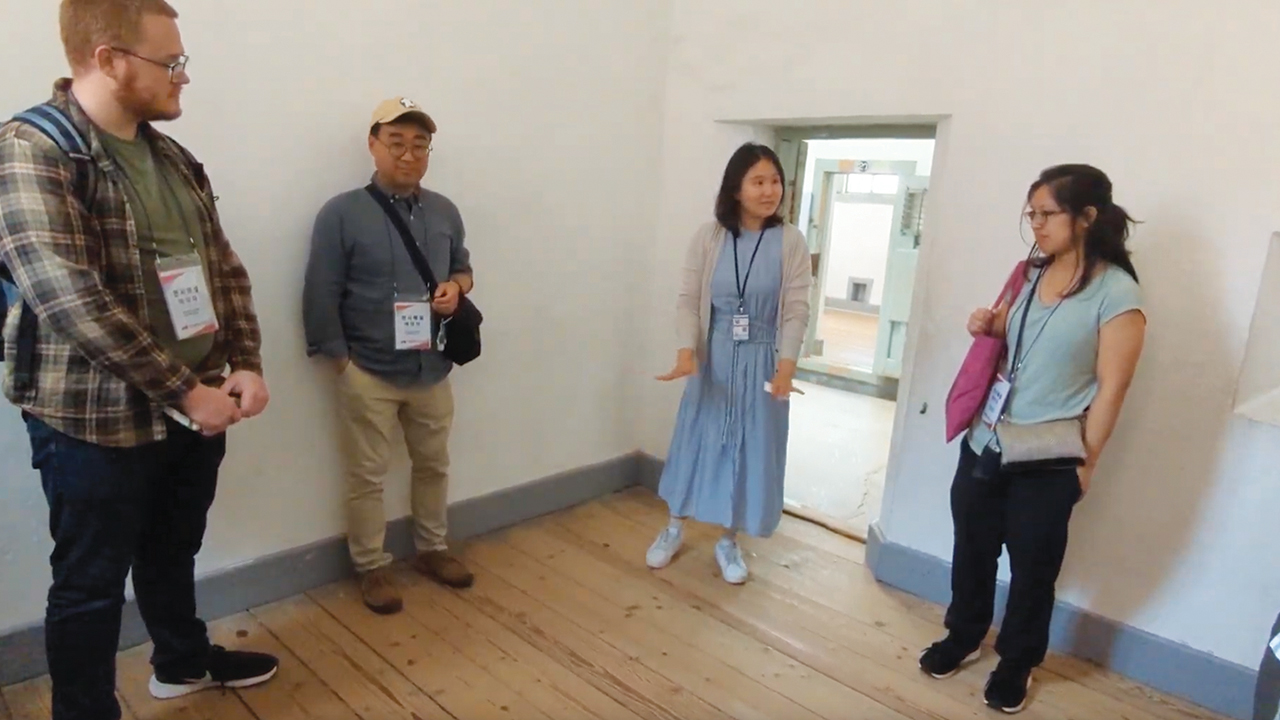Tour group inside a prison