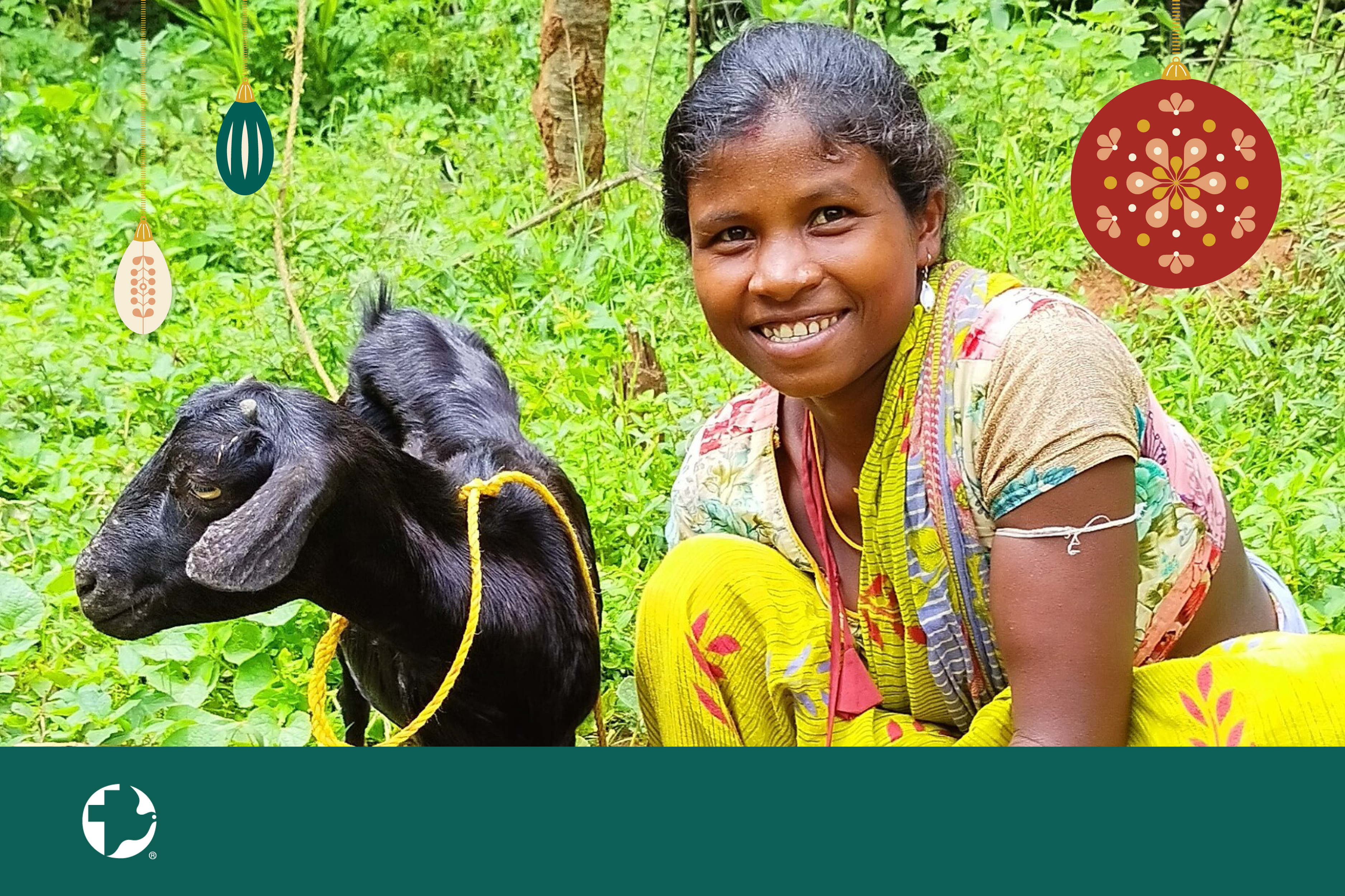 A young girl smiling next to a goat