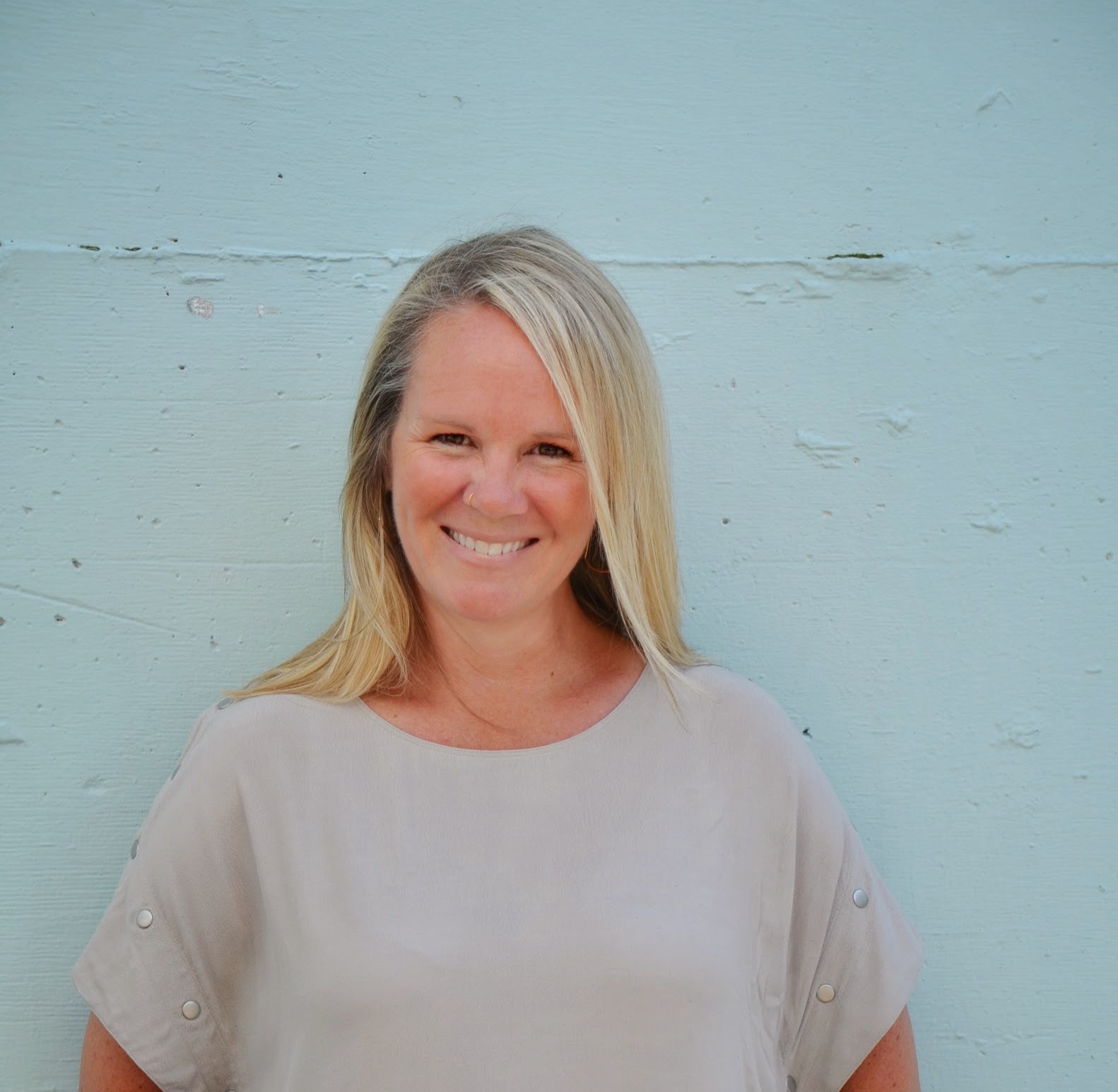A woman smiling for a photo