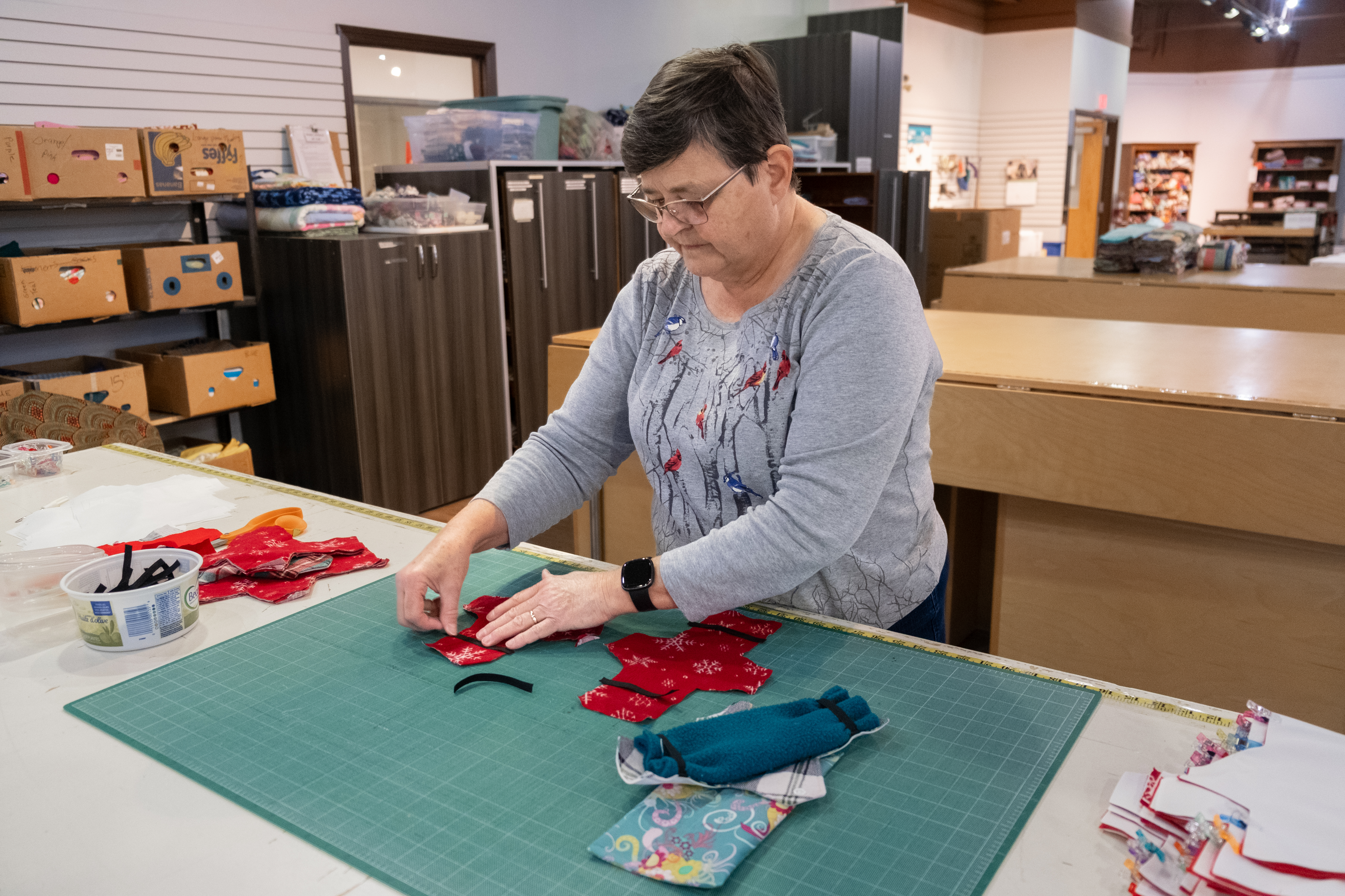An MCC volunteer puts together hygiene kits at a center in Ontario. 