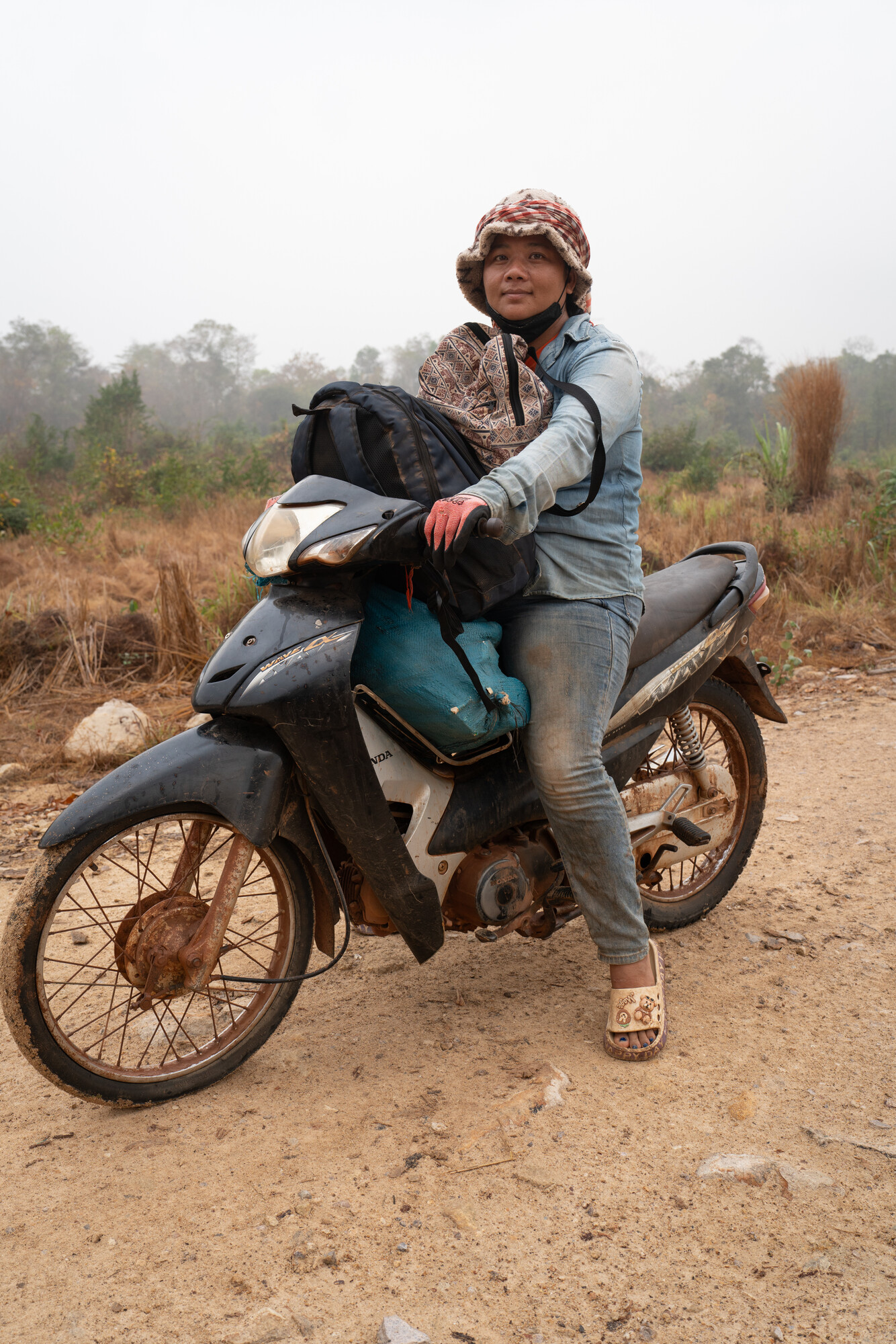 Sor Navy, 36, a member of the Prey Lang Community Network (PLCN) in Kratié province, prepared to depart for the village of Vattanak.