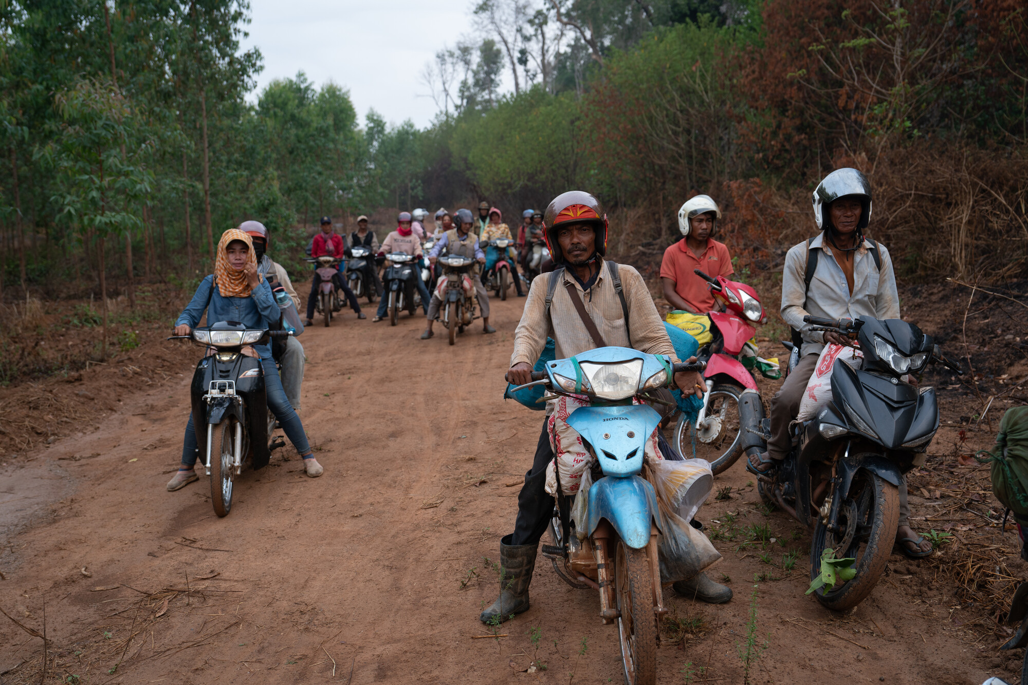 Forest patrol members arrive at an area called “Three-Rocks,” which the indigenous people revere that holds deep cultural significance, with each rock symbolizing a different aspect of their spiri