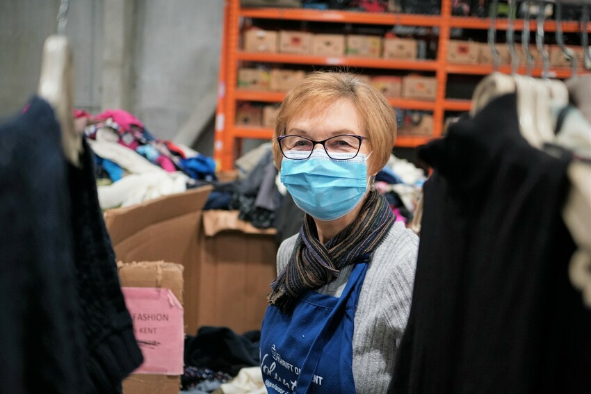 Irene Klassen sorts clothing at Thrift on Kent in Kitchener. The thousands of Thrift volunteers in Ontario have been steadfast in their support of MCC through the closures and limited reopenings throu