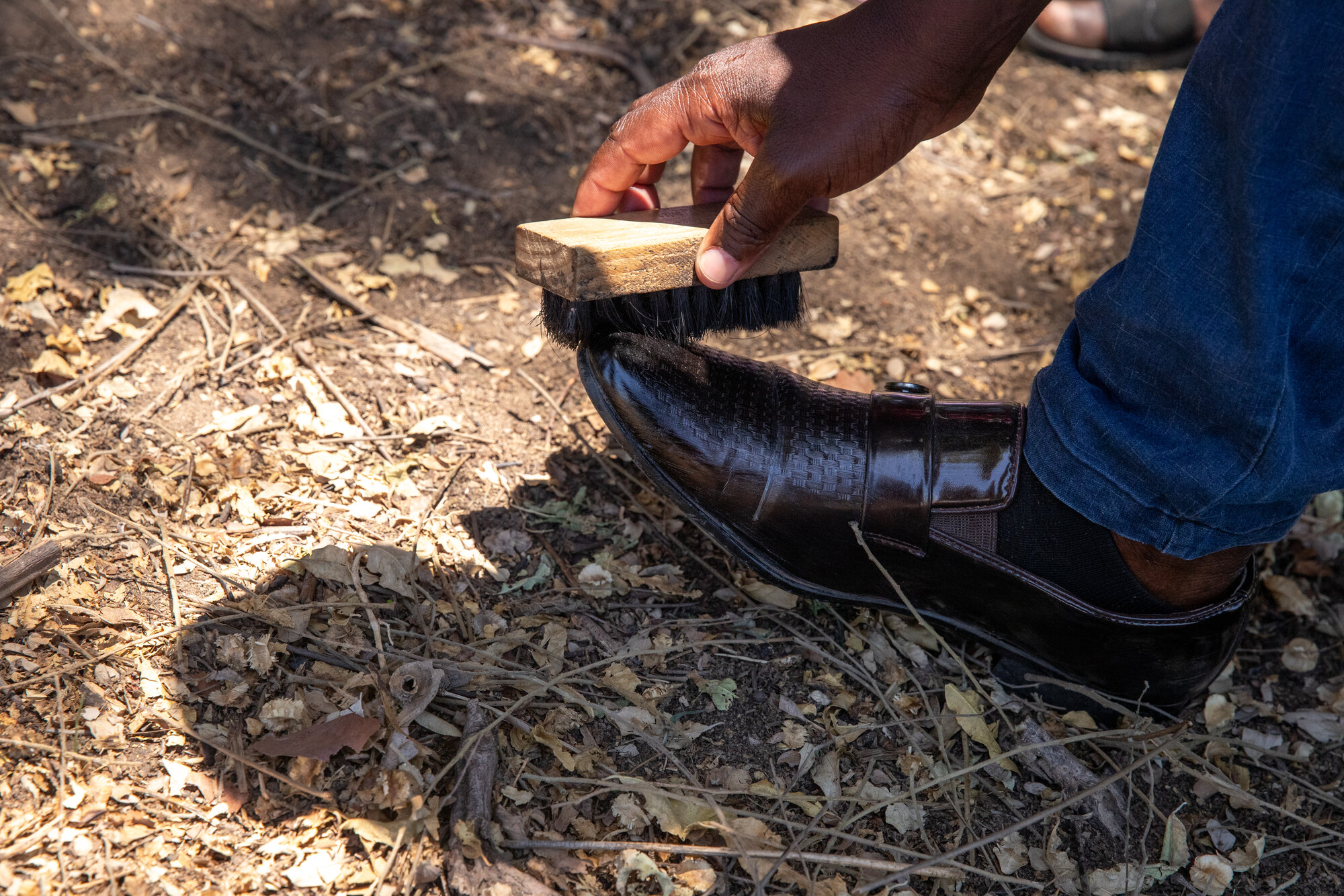 The youth beekeepers' group in Samende village makes various products from the wax from their hives, including shoe polish.