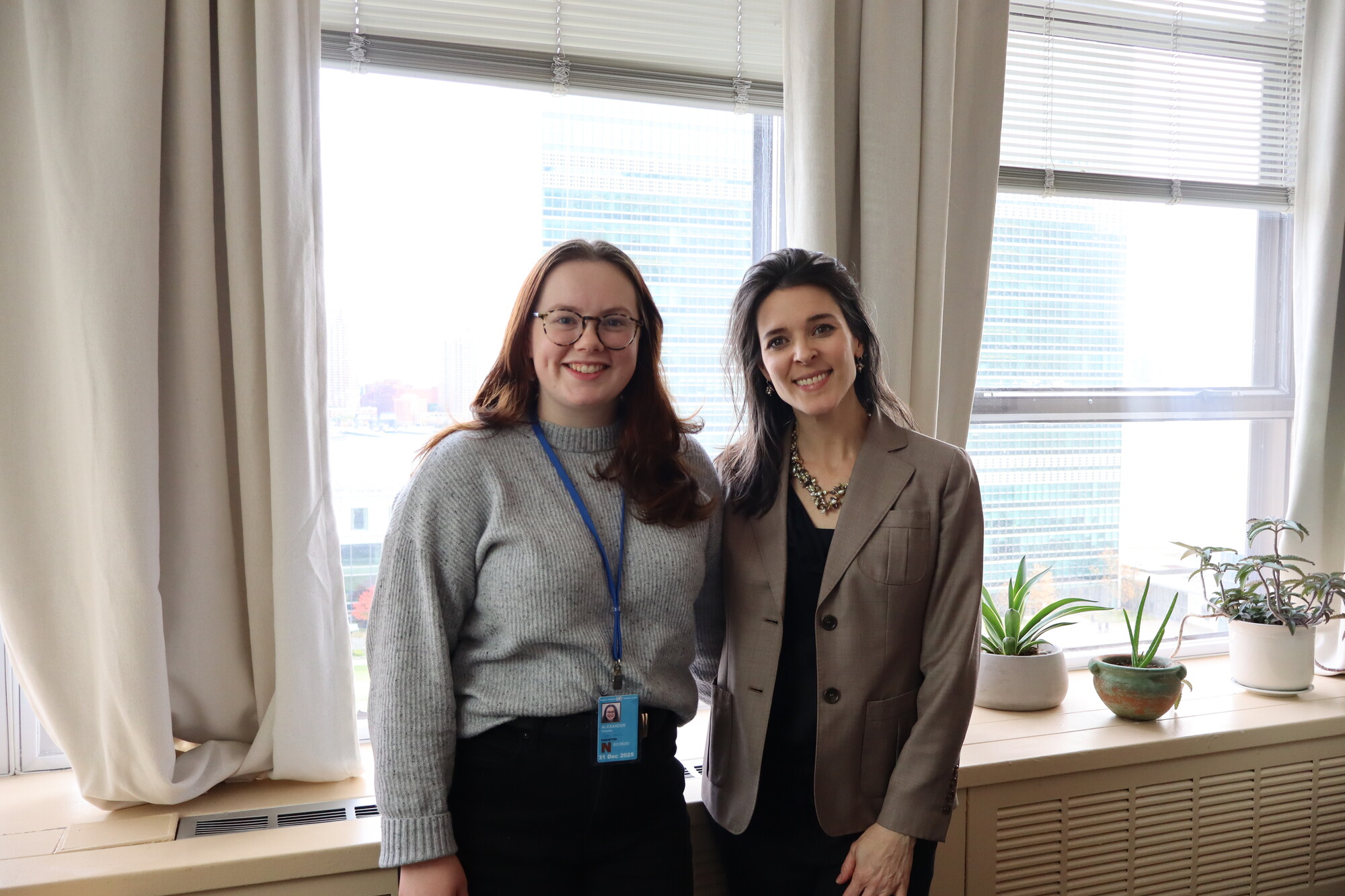 MCC United Nations Office staff Victoria Alexander and Ashley Gagné smile for a photo at the MCC UN Student Seminar in New York City in November 2025.