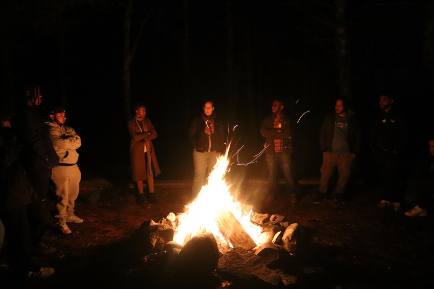 Participants in the "Peace for the weary" camp for young adults gather around a campfire for a time of worship, singing and a story telling by facilitator Jessica Buller.

The week-long camp was hel