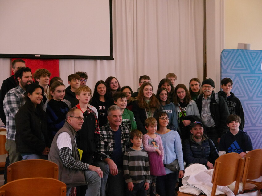 Youth and adults from Mosaic Mennonite Conference congregations gathered for a group photo at MCC’s MLK service day event at Germantown Mennonite Church (Philadelphia, Pa.) in January 2024.