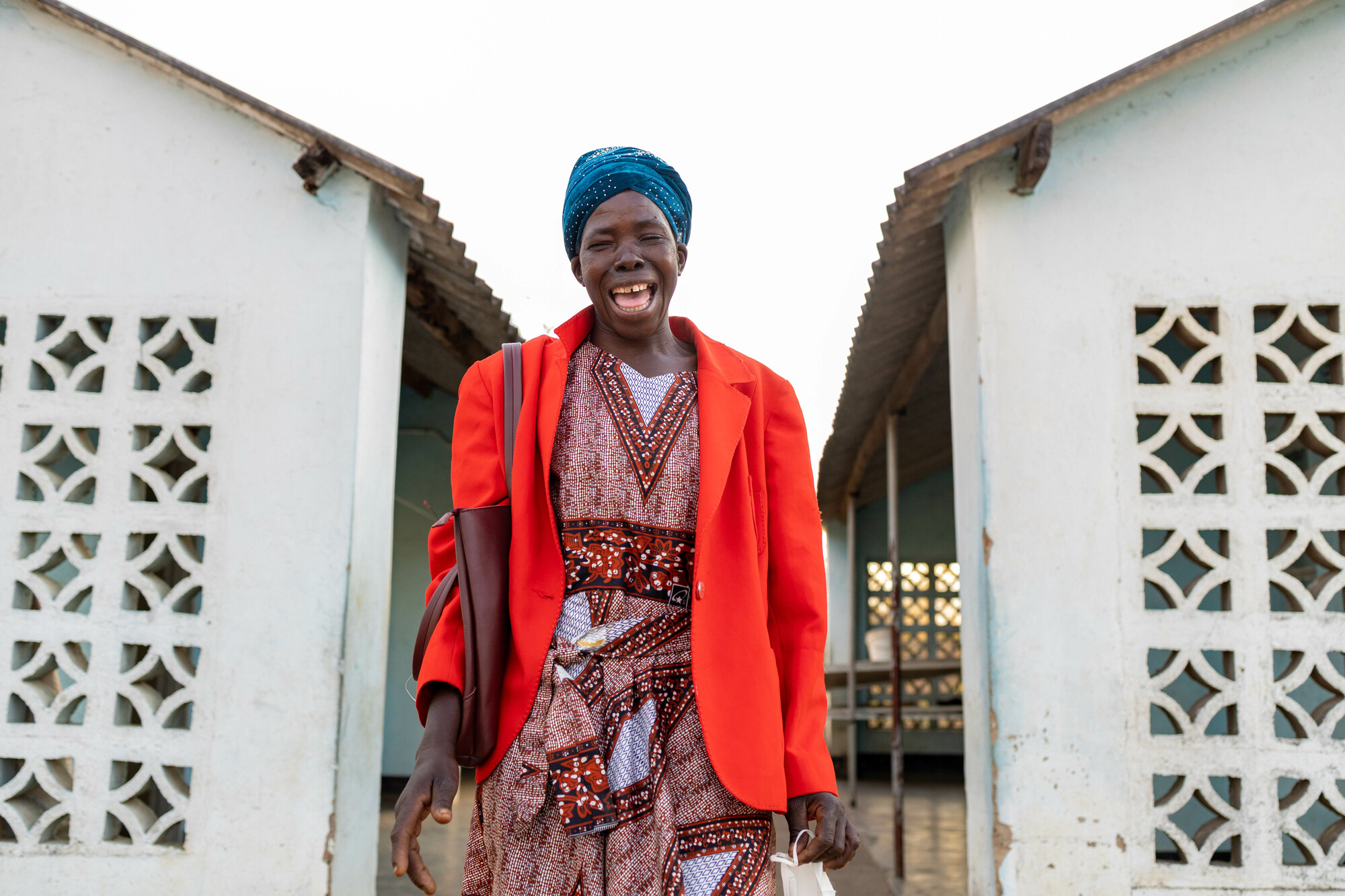 Portrait of Kiasi Chadenga at the Nehanda clinic. She was bitten by a snake at night on her way to the toilets while pregnant and staying at the clinic before they had solar panels. Now the clinic has