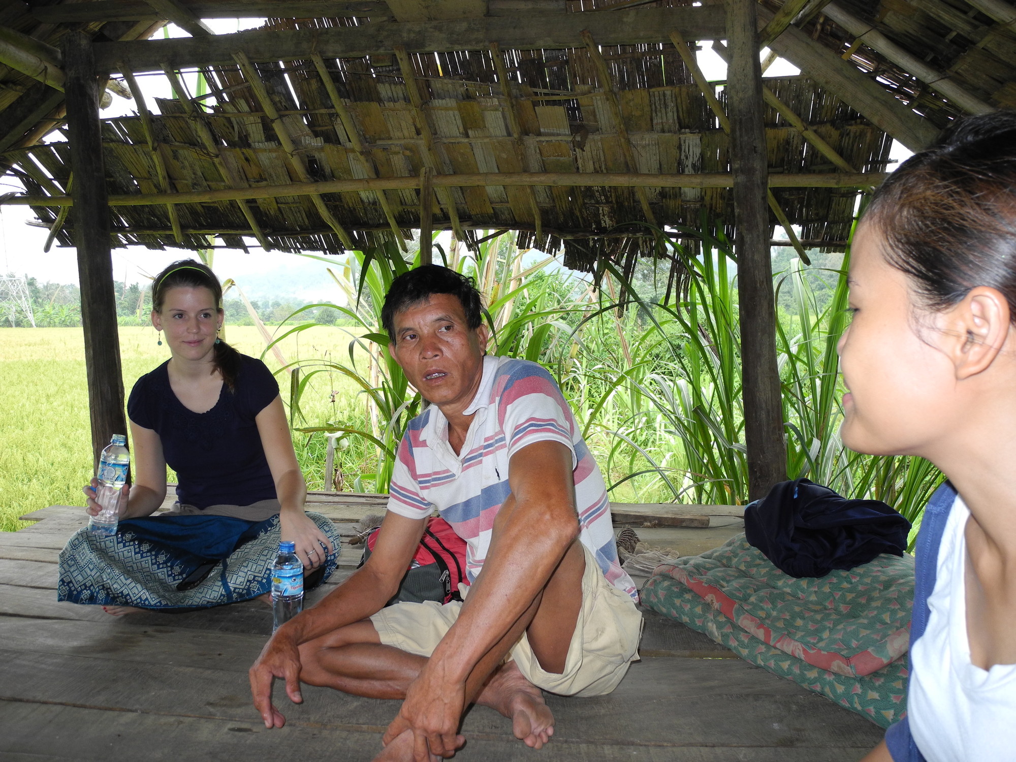 Uncle BounNyang Noysumphan is a local agriculture technician in Ban Pou Village in Tha Thom District, Lao People's Democratic Republic. MCC staff visited rice farmers in Ban Pou who are participating