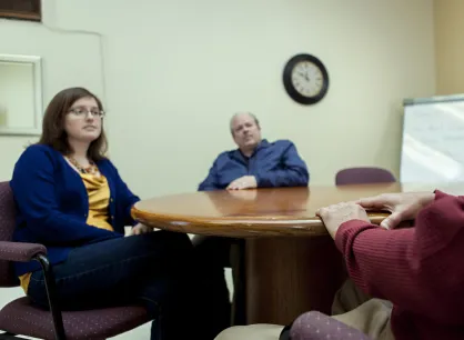 Christina Farnsworth and Mike Dawson talk with a CoSA participant. Moncton Community Chaplaincy in New Brunswick is an MCC partner that runs Circles of Support and Accountability for people who commit