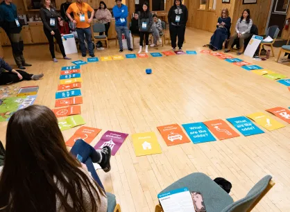 At the Young Adult Peacebuilders Training in Colorado Springs, participants experience You Got Booked, a learning exercise that highlights the racial disparities embedded in the criminal legal system