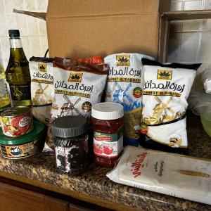 A selection of dried and canned goods that are distributed to food relief recipients