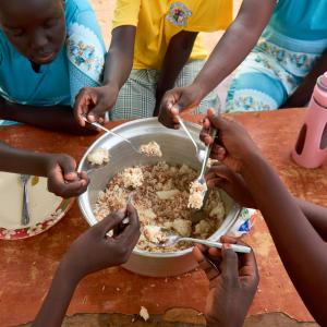Kids enjoying a meal.