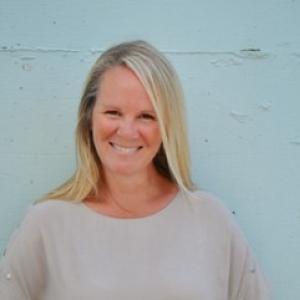 A woman smiling for a photo