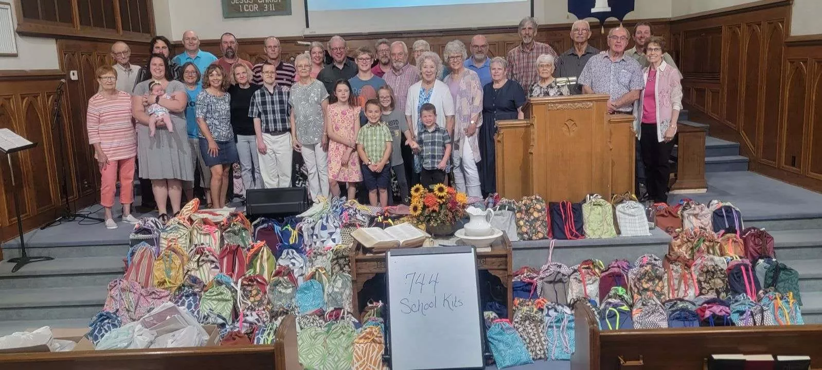 Members from a church pack school kits for MCC's School Kit Challenge.