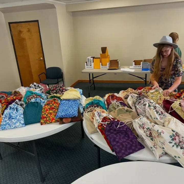 Members from a church pack school kits for MCC's School Kit Challenge.