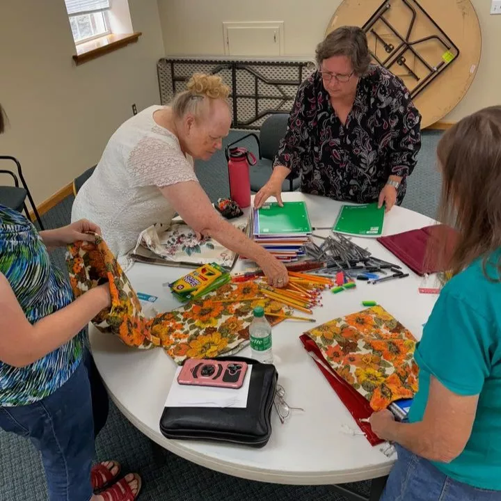 Members from a church pack school kits for MCC's School Kit Challenge.