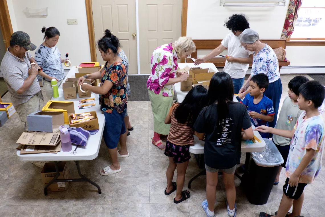 “The first Monday of every month we knot comforts however August is school kit time. It is a small way we can connect with the many displaced peoples of the world through the work of Mennonite Central Committee.”  Photo courtesy of Jonathan Charles, Pennsylvania