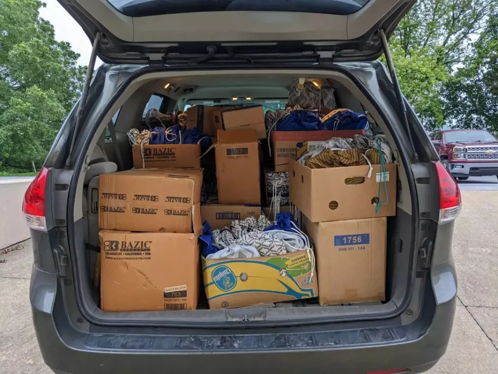 Members from a church pack school kits for MCC's School Kit Challenge.