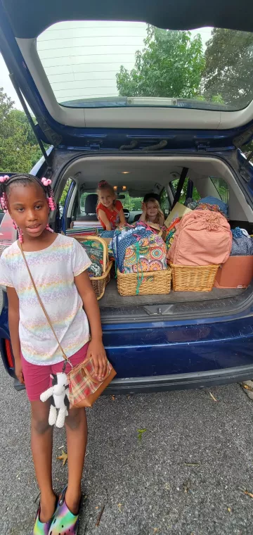 Members from a church pack school kits for MCC's School Kit Challenge.